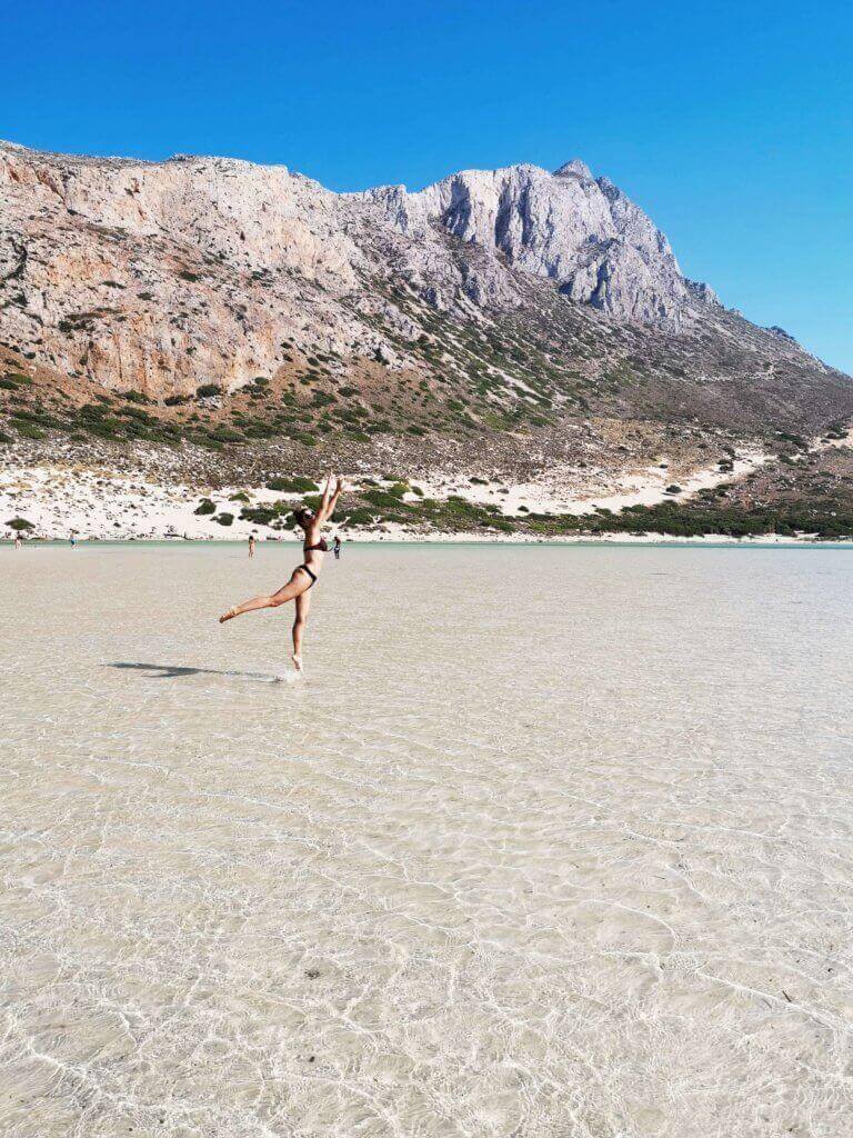 girl in balos beach in crete